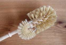 Wooden toilet brush with edge cleaner and tampico bristles